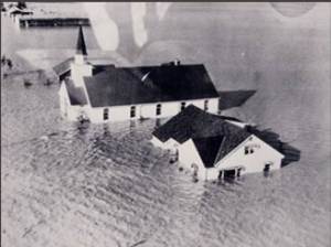 Flood waters surround church