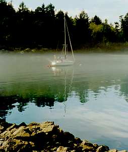 Sailboat in fog