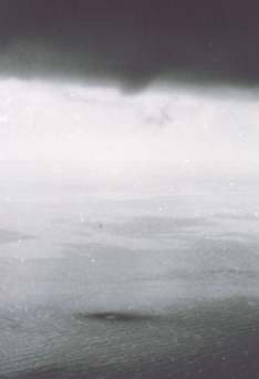 Dark spot indicates forming waterspout